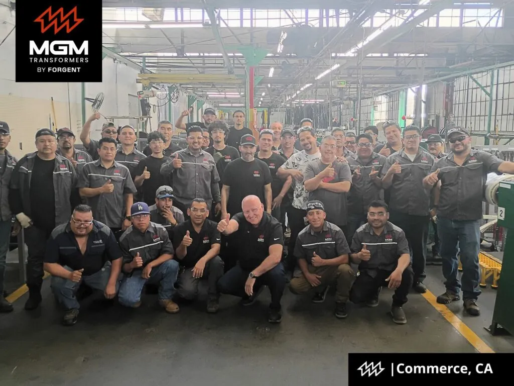 MGM Transformers team celebrating 500 days injury-free at Commerce, CA manufacturing facility with workers posing together