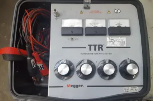 Megger TTR transformer turns ratio tester with four control knobs and test terminals